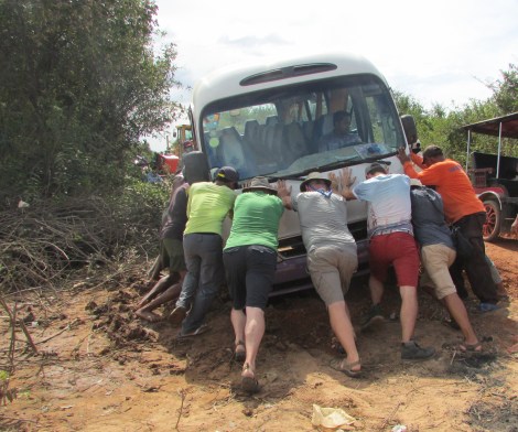 Pushing doesn't work. Mark (in green) putting his back in to it